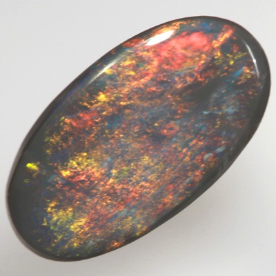 SOLID BLACK OPAL Bright golden fire, rose gold to yellow gold